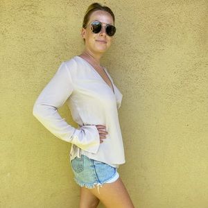 Wrap blouse. Light pink, so cute and professional!